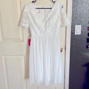 JJs House wedding dress. Knee length, size 8.